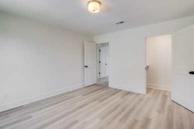 This home has been totally renovated and is located on the #7 on Diamondhead Country Club in Mississippi - for sale on GolfHomes.com, golf home, golf lot