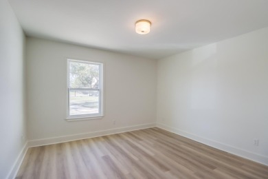 This home has been totally renovated and is located on the #7 on Diamondhead Country Club in Mississippi - for sale on GolfHomes.com, golf home, golf lot
