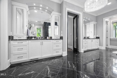 Welcome to an unparalleled sanctuary of luxury!  This on Hasentree Club in North Carolina - for sale on GolfHomes.com, golf home, golf lot