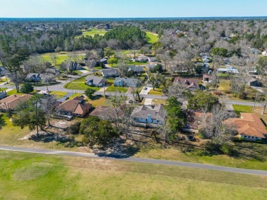 This home has been totally renovated and is located on the #7 on Diamondhead Country Club in Mississippi - for sale on GolfHomes.com, golf home, golf lot