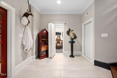 Welcome to an unparalleled sanctuary of luxury!  This on Hasentree Club in North Carolina - for sale on GolfHomes.com, golf home, golf lot