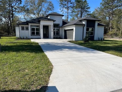 This Captivating,upgraded, Custom,solid & beautiful floor plan on Citrus Springs Country Club in Florida - for sale on GolfHomes.com, golf home, golf lot