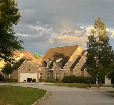 Motivated Seller! Beautiful all brick lake front home on Lake on The Patriot Golf Club At Grand Harbor in South Carolina - for sale on GolfHomes.com, golf home, golf lot