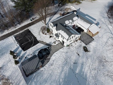 Nestled on 1.13 peaceful acres overlooking the 13th hole of on  in New York - for sale on GolfHomes.com, golf home, golf lot