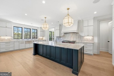 COMPLETELY RENOVATED. REIMAGINED. PRACTICALLY REBUILT FROM THE on Great Waters Course At Reynolds Plantation in Georgia - for sale on GolfHomes.com, golf home, golf lot