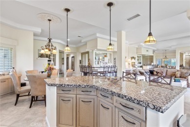 From the moment you're greeted with a smile at the attended gate on Palm Valley Country Club in California - for sale on GolfHomes.com, golf home, golf lot