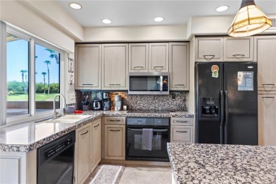 From the moment you're greeted with a smile at the attended gate on Palm Valley Country Club in California - for sale on GolfHomes.com, golf home, golf lot