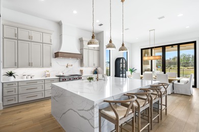 Gracefully situated within the gates of Watersound Camp Creek - on Camp Creek Golf Course in Florida - for sale on GolfHomes.com, golf home, golf lot