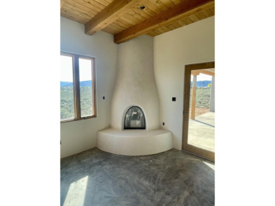 UNDER CONSTRUCTION-Targeted completion date of June. After some on Taos Country Club in New Mexico - for sale on GolfHomes.com, golf home, golf lot