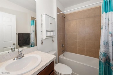 Fully furnished, turnkey home with a private south-facing on Herons Glen Golf and Country Club in Florida - for sale on GolfHomes.com, golf home, golf lot