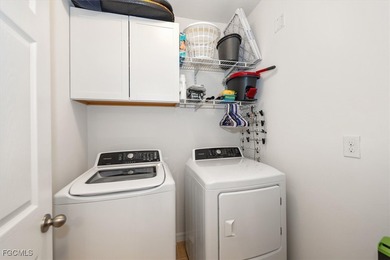 Fully furnished, turnkey home with a private south-facing on Herons Glen Golf and Country Club in Florida - for sale on GolfHomes.com, golf home, golf lot