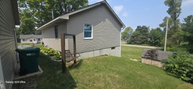 REDUCED!!Deeded Water access allowing you to dock your boat & on Pine View Highlands Golf Course in Michigan - for sale on GolfHomes.com, golf home, golf lot