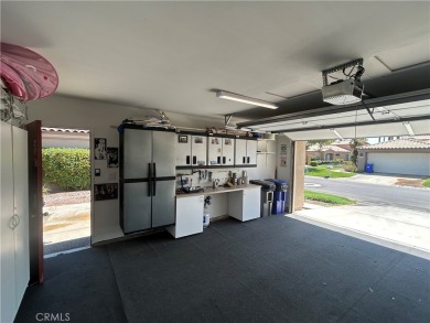 From the moment you're greeted with a smile at the attended gate on Palm Valley Country Club in California - for sale on GolfHomes.com, golf home, golf lot
