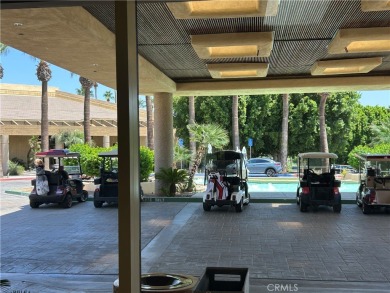 From the moment you're greeted with a smile at the attended gate on Palm Valley Country Club in California - for sale on GolfHomes.com, golf home, golf lot
