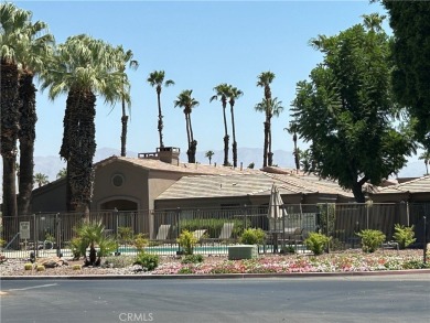 From the moment you're greeted with a smile at the attended gate on Palm Valley Country Club in California - for sale on GolfHomes.com, golf home, golf lot