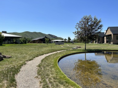 The last interior corner lot in Streamside features a berm and on The Valley Club in Idaho - for sale on GolfHomes.com, golf home, golf lot