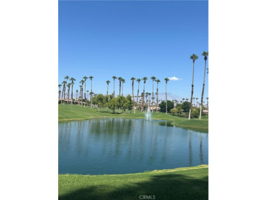 From the moment you're greeted with a smile at the attended gate on Palm Valley Country Club in California - for sale on GolfHomes.com, golf home, golf lot