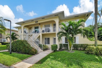 Meticulously maintained, spacious, first floor corner condo with on Villa Del Ray Golf Club in Florida - for sale on GolfHomes.com, golf home, golf lot