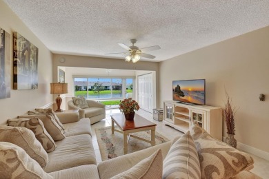 Meticulously maintained, spacious, first floor corner condo with on Villa Del Ray Golf Club in Florida - for sale on GolfHomes.com, golf home, golf lot