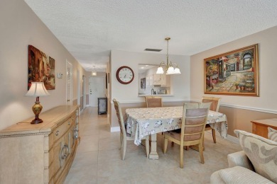 Meticulously maintained, spacious, first floor corner condo with on Villa Del Ray Golf Club in Florida - for sale on GolfHomes.com, golf home, golf lot