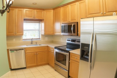 Welcome home to this 3BR/2.5BA with a garage in the heart of on The Links At Boynton Beach - The Family Course in Florida - for sale on GolfHomes.com, golf home, golf lot