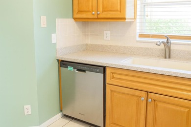 Welcome home to this vibrant 55+ 3BR/2.5BA villa with a garage on The Links At Boynton Beach - The Family Course in Florida - for sale on GolfHomes.com, golf home, golf lot