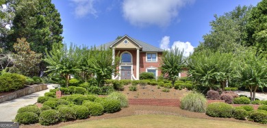 NEW ROOF! Experience GRAND ELEGANCE in this prestigious estate on Eagles Landing Country Club in Georgia - for sale on GolfHomes.com, golf home, golf lot