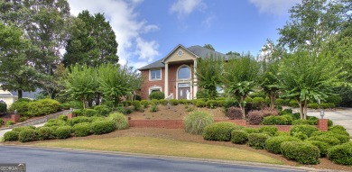 NEW ROOF! Experience GRAND ELEGANCE in this prestigious estate on Eagles Landing Country Club in Georgia - for sale on GolfHomes.com, golf home, golf lot