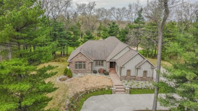 Welcome to your dream home on the prestigious #12 green at on Stonegate Golf Club in Michigan - for sale on GolfHomes.com, golf home, golf lot