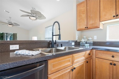 Experience Southwest Florida living in this thoughtfully on Heritage Palms Golf and Country Club in Florida - for sale on GolfHomes.com, golf home, golf lot