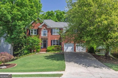 Perfectly positioned on the fairway of the par-5 2nd hole in the on Towne Lake Hills Golf Club in Georgia - for sale on GolfHomes.com, golf home, golf lot