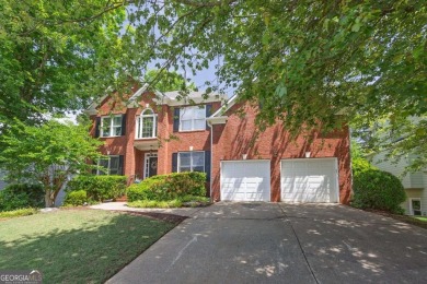 Perfectly positioned on the fairway of the par-5 2nd hole in the on Towne Lake Hills Golf Club in Georgia - for sale on GolfHomes.com, golf home, golf lot