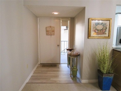 Come see this absolutely stunning and meticulously maintained 2 on East Bay Golf Club in Florida - for sale on GolfHomes.com, golf home, golf lot