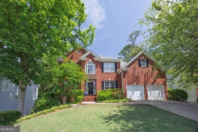 Perfectly positioned on the fairway of the par-5 2nd hole in the on Towne Lake Hills Golf Club in Georgia - for sale on GolfHomes.com, golf home, golf lot