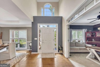 Perfectly positioned on the fairway of the par-5 2nd hole in the on Towne Lake Hills Golf Club in Georgia - for sale on GolfHomes.com, golf home, golf lot