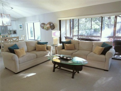 Come see this absolutely stunning and meticulously maintained 2 on East Bay Golf Club in Florida - for sale on GolfHomes.com, golf home, golf lot