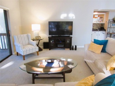 Come see this absolutely stunning and meticulously maintained 2 on East Bay Golf Club in Florida - for sale on GolfHomes.com, golf home, golf lot
