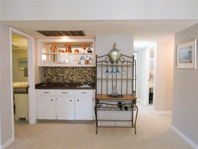 Come see this absolutely stunning and meticulously maintained 2 on East Bay Golf Club in Florida - for sale on GolfHomes.com, golf home, golf lot