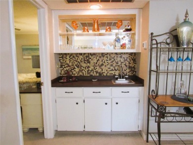 Come see this absolutely stunning and meticulously maintained 2 on East Bay Golf Club in Florida - for sale on GolfHomes.com, golf home, golf lot