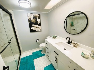 Come see this absolutely stunning and meticulously maintained 2 on East Bay Golf Club in Florida - for sale on GolfHomes.com, golf home, golf lot