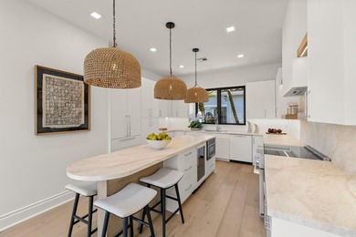 Sophisticated Style Meets Effortless Comfort in This Modern on Palm Beach Polo and Country Club in Florida - for sale on GolfHomes.com, golf home, golf lot