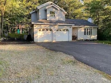 This beautiful contemporary home is a great investment property on Pocono Farms Country Club in Pennsylvania - for sale on GolfHomes.com, golf home, golf lot