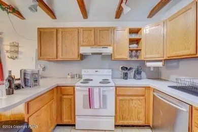 This beautiful contemporary home is a great investment property on Pocono Farms Country Club in Pennsylvania - for sale on GolfHomes.com, golf home, golf lot