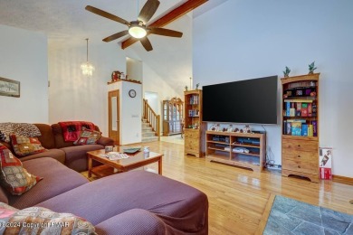 This beautiful contemporary home is a great investment property on Pocono Farms Country Club in Pennsylvania - for sale on GolfHomes.com, golf home, golf lot