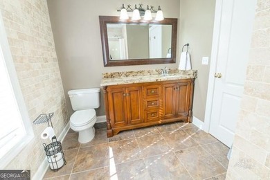 Newly updated family home with great views of the golf course on Nob North Golf Course in Georgia - for sale on GolfHomes.com, golf home, golf lot