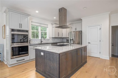 Discover refined Southern living in this nearly new home located on Savannah Quarters Country Club in Georgia - for sale on GolfHomes.com, golf home, golf lot