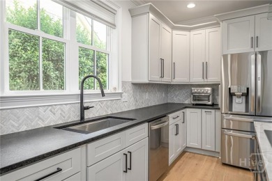 Discover refined Southern living in this nearly new home located on Savannah Quarters Country Club in Georgia - for sale on GolfHomes.com, golf home, golf lot