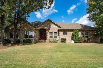 Beautiful home w/great curb appeal w/ 3 car side entry garage on Centennial Valley Golf Course in Arkansas - for sale on GolfHomes.com, golf home, golf lot