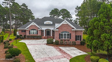 Gorgeous custom brick home sitting on a private .48/acre cul de on Ocean Ridge Plantation in North Carolina - for sale on GolfHomes.com, golf home, golf lot