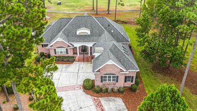 Gorgeous custom brick home sitting on a private .48/acre cul de on Ocean Ridge Plantation in North Carolina - for sale on GolfHomes.com, golf home, golf lot